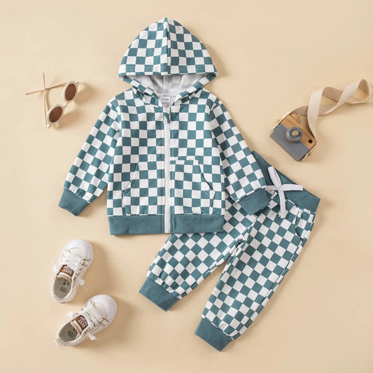 Cozy cotton two-piece zip-up set for kids by Undefyning Lynes, featuring a comfortable hoodie and matching pants for little adventurers.