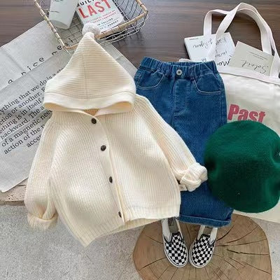 Kids' cozy knit hooded cardigan by Undefyning Lynes, featuring soft fabric and stylish design for everyday wear.