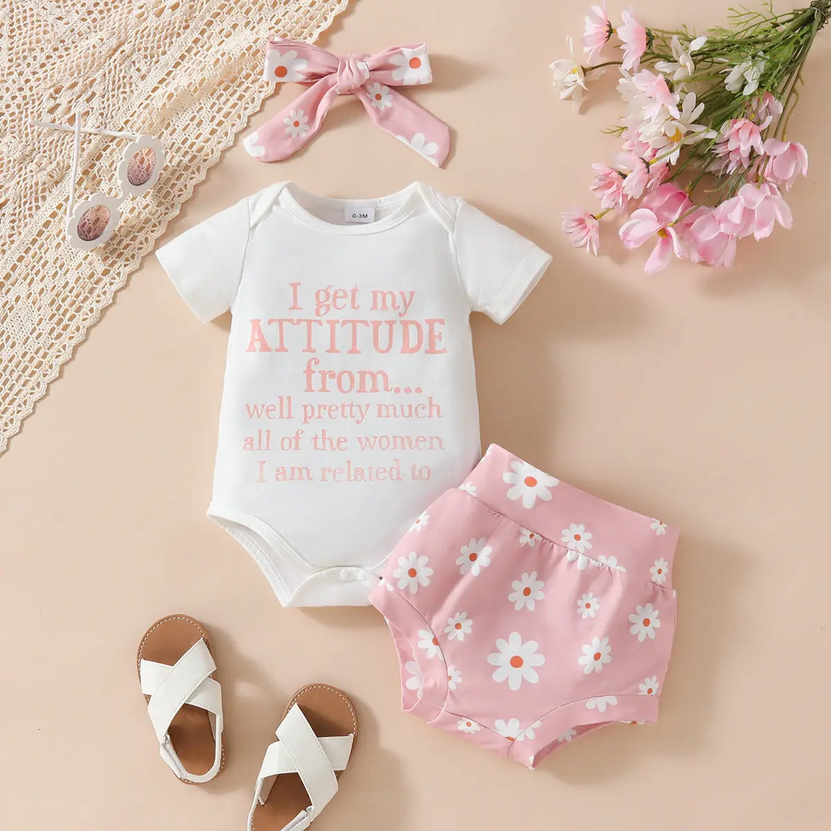 Undefyning Lynes Daisy Days 3-piece baby romper set featuring soft, colorful fabric with playful Daisy patterns for infants.