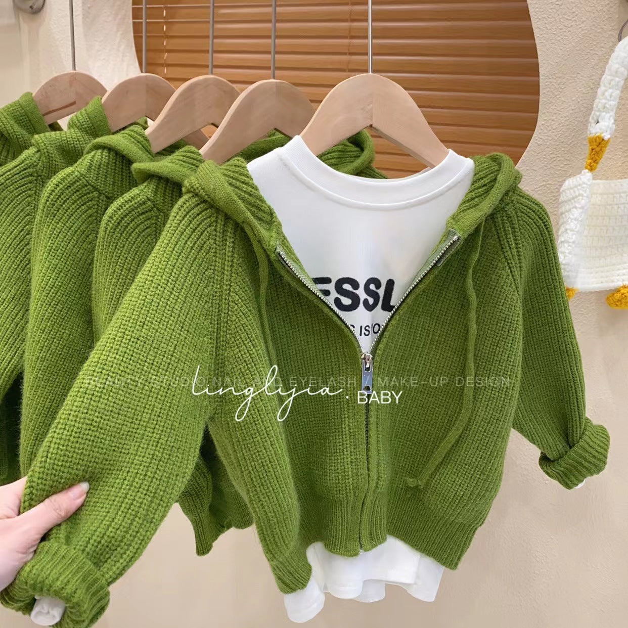 Kids' cozy knit hooded cardigan by Undefyning Lynes, soft and stylish, perfect for everyday wear and adventures.