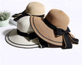 Wide-Brim Straw Hat with Bow - front view
