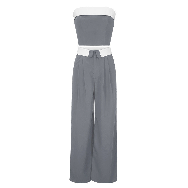 Undefyning Lynes contrast color vest and wide-leg pants two-piece set displayed on a mannequin, showcasing stylish fashion ensemble.