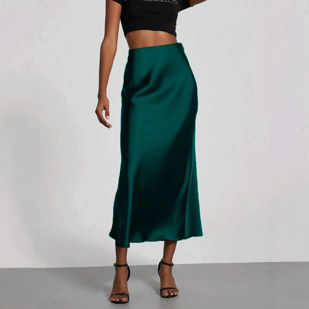 Satin midi skirt in cream against a plain background