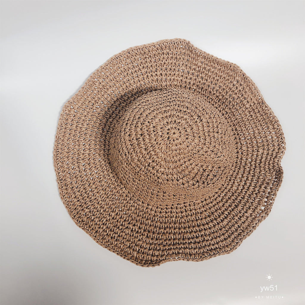 Foldable Wide-Brim Straw Sun Hat — folded for packing