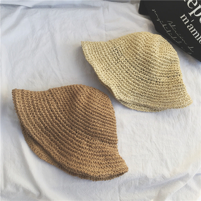 Foldable Wide-Brim Straw Sun Hat — worn on model