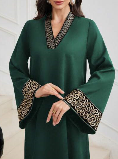 Embossed retro puff-sleeve V-neck dress by Undefyning Lynes featuring embroidered artistic design and elegant style.
