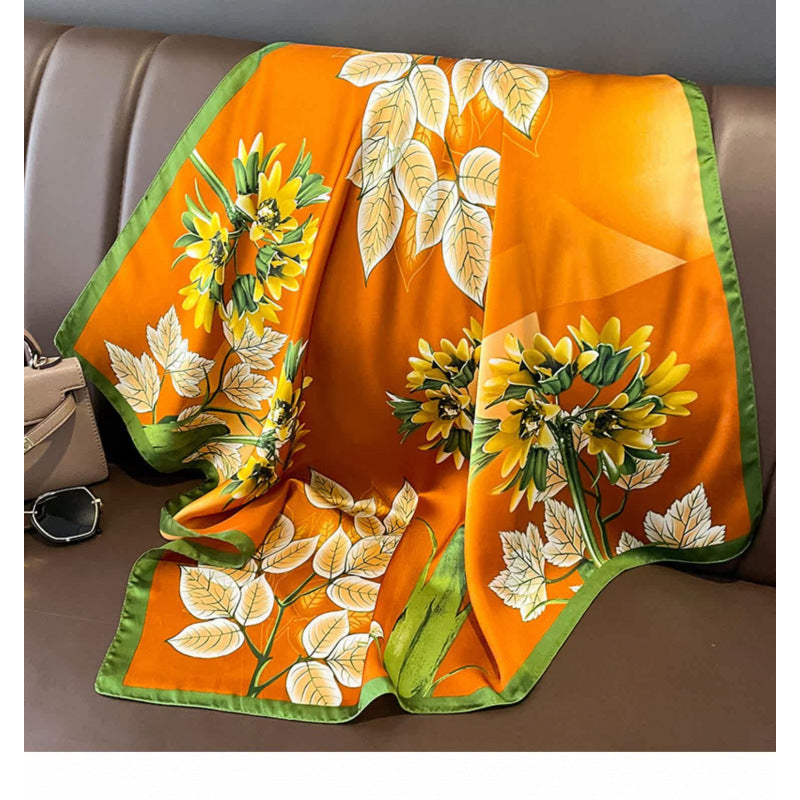 Vibrant dopamine silk-feel scarf by Undefyning Lynes, featuring bright colors and a soft, silky texture for stylish everyday wear.