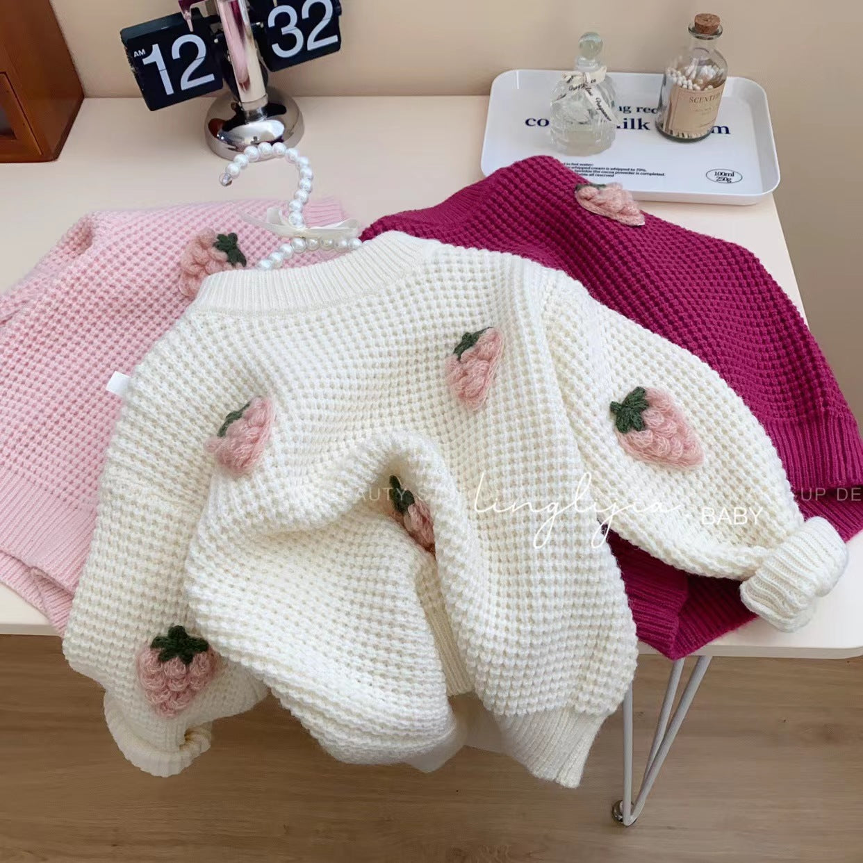Kids' cozy knit hooded cardigan by Undefyning Lynes, soft and stylish for everyday wear and adventures.