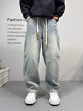 Rebel Washed Straight Jeans - patchwork detail