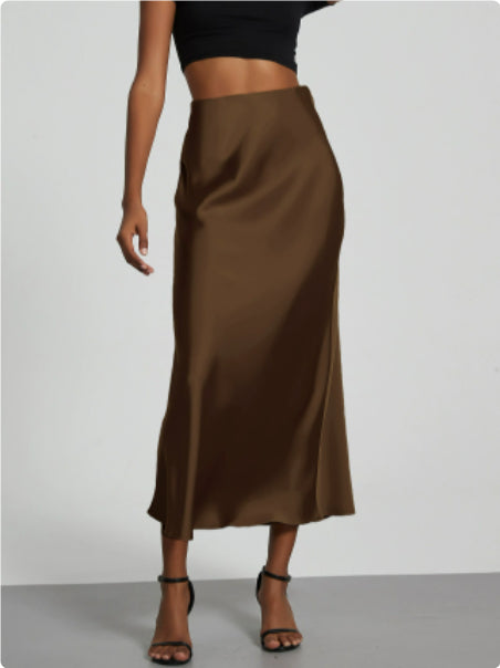 Satin midi skirt laid flat showing the slim cut