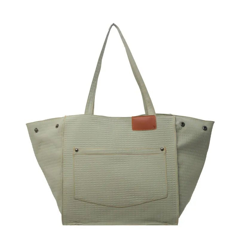 Essential Canvas Bucket Bag: Effortless Organization Meets Everyday Style - Undefyning Lynes