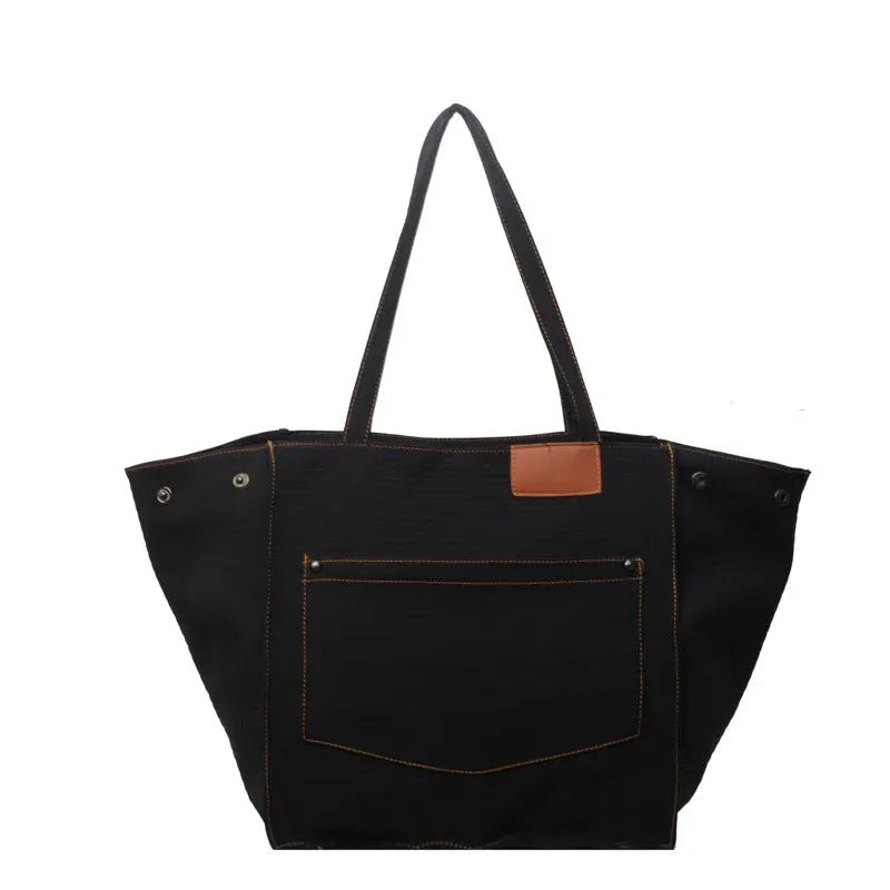 Essential Canvas Bucket Bag: Effortless Organization Meets Everyday Style - Undefyning Lynes