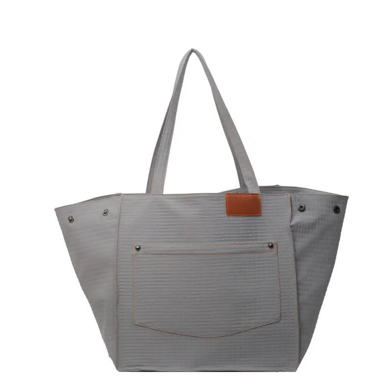 Essential Canvas Bucket Bag: Effortless Organization Meets Everyday Style - Undefyning Lynes