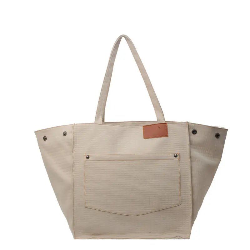 Essential Canvas Bucket Bag: Effortless Organization Meets Everyday Style - Undefyning Lynes