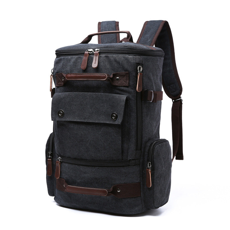 Undefyning Lynes vintage black washed canvas laptop backpack with microfiber leather trim and multiple zip pockets.