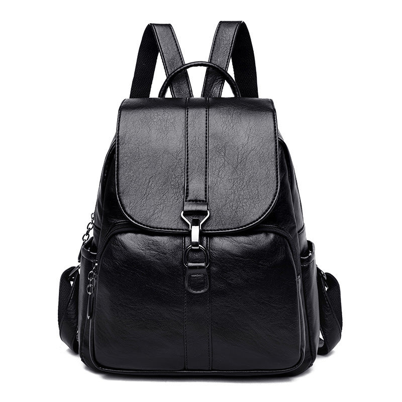 Undefyning Lynes black sheepskin leather backpack with a vertical square silhouette and front flap closure.