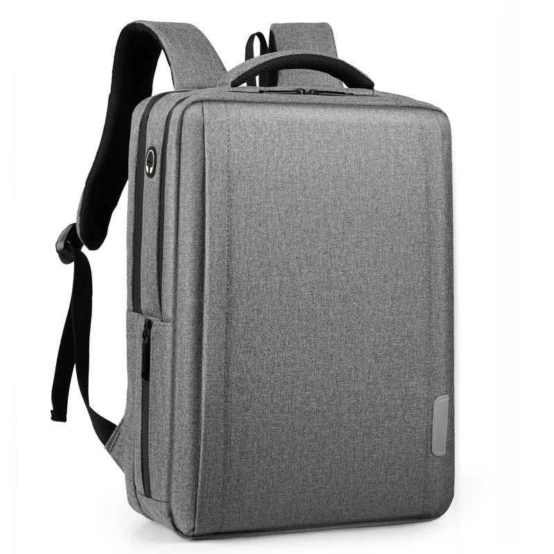 Undefyning Lynes light grey structured tech commuter laptop backpack with padded straps and organized compartments.