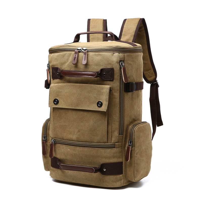 Undefyning Lynes khaki washed canvas laptop backpack with microfiber leather trim and multiple zip compartments.